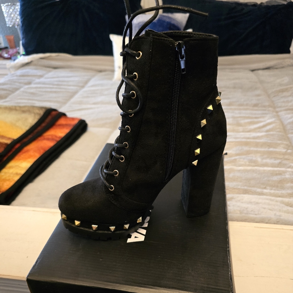 Heeled Black gold studded booties